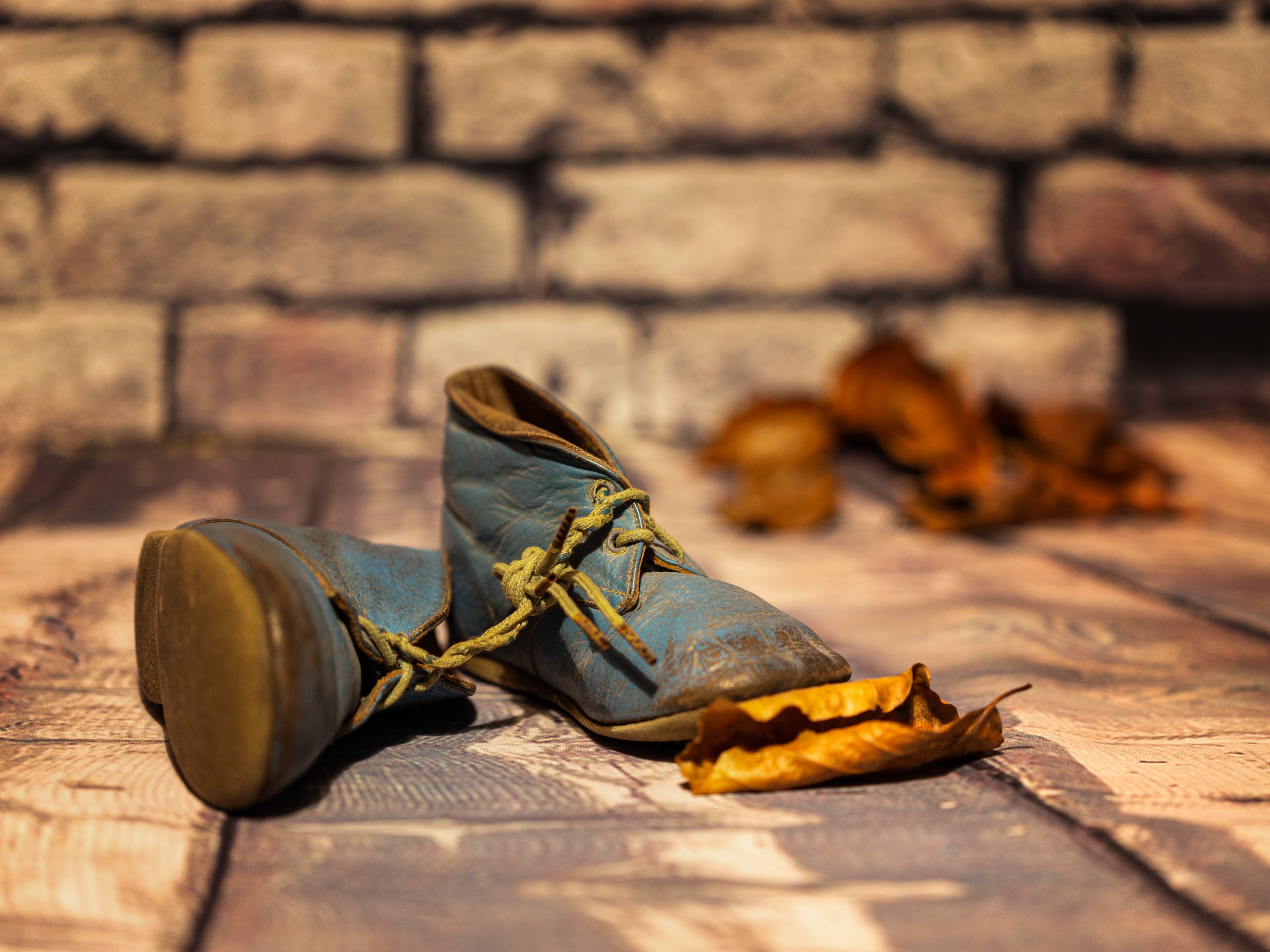 A pair of well-loved children's shoes